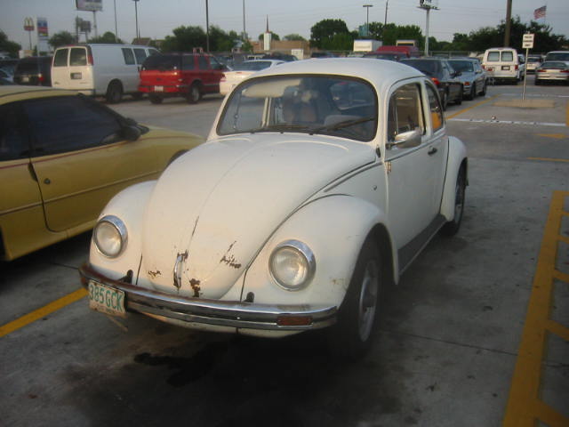 White Mexican Volkswagen Beetle from the 1980s.jpg