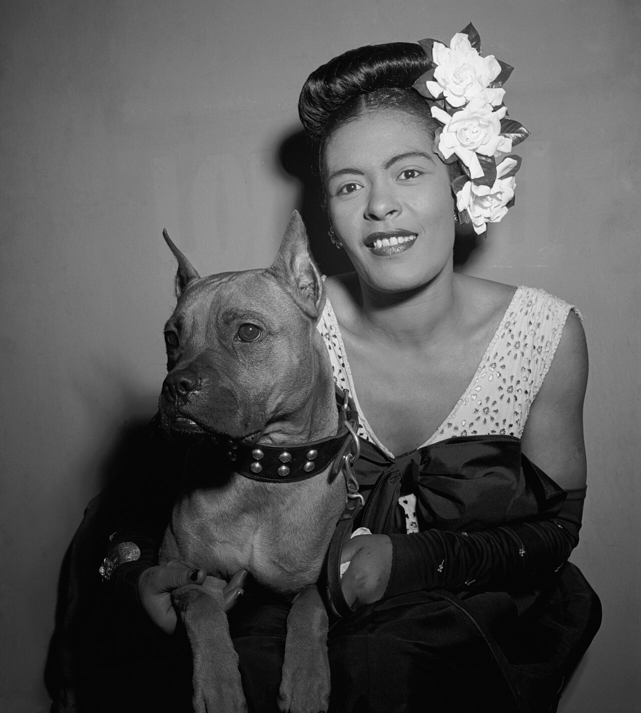 Portrait of Billie Holiday and Mister, Downbeat, New York, N.Y., ca. Feb. 1947 (LOC, 5020400274, cropped).jpg